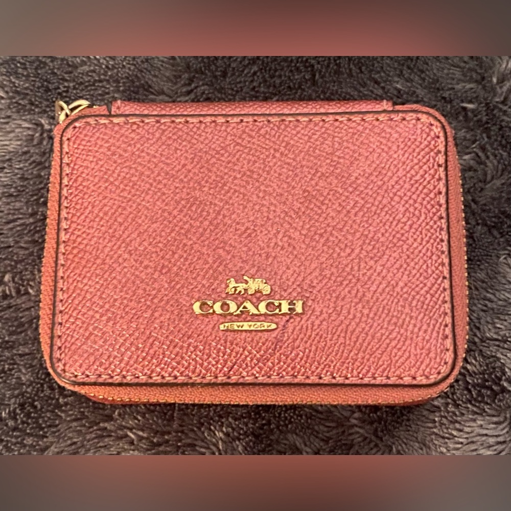 Coach Pink Leather medicine holder.